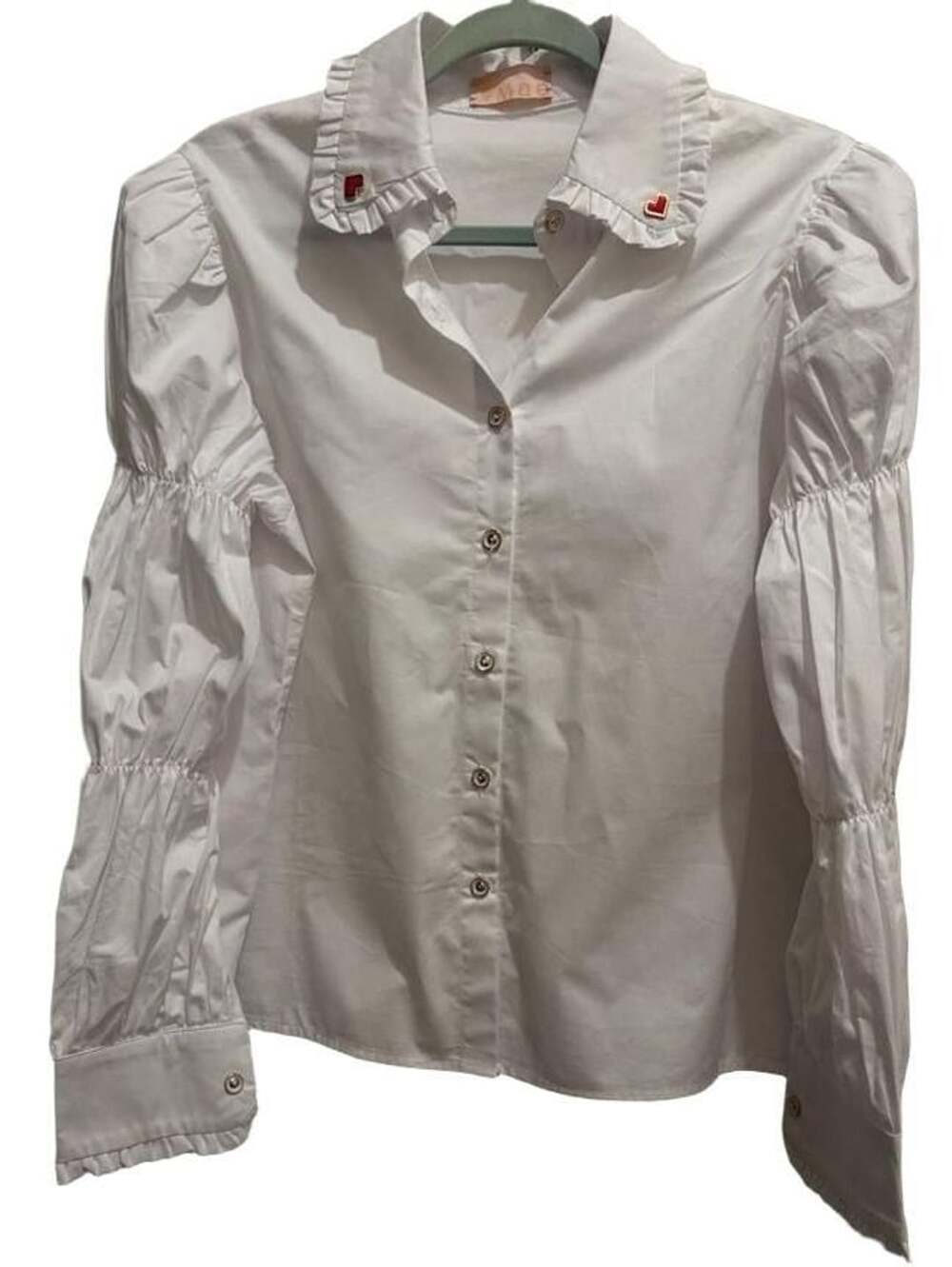Mae White Button-Up Blouse with Ruffled Collar, Red Heart Pins, and Ruched Sleev